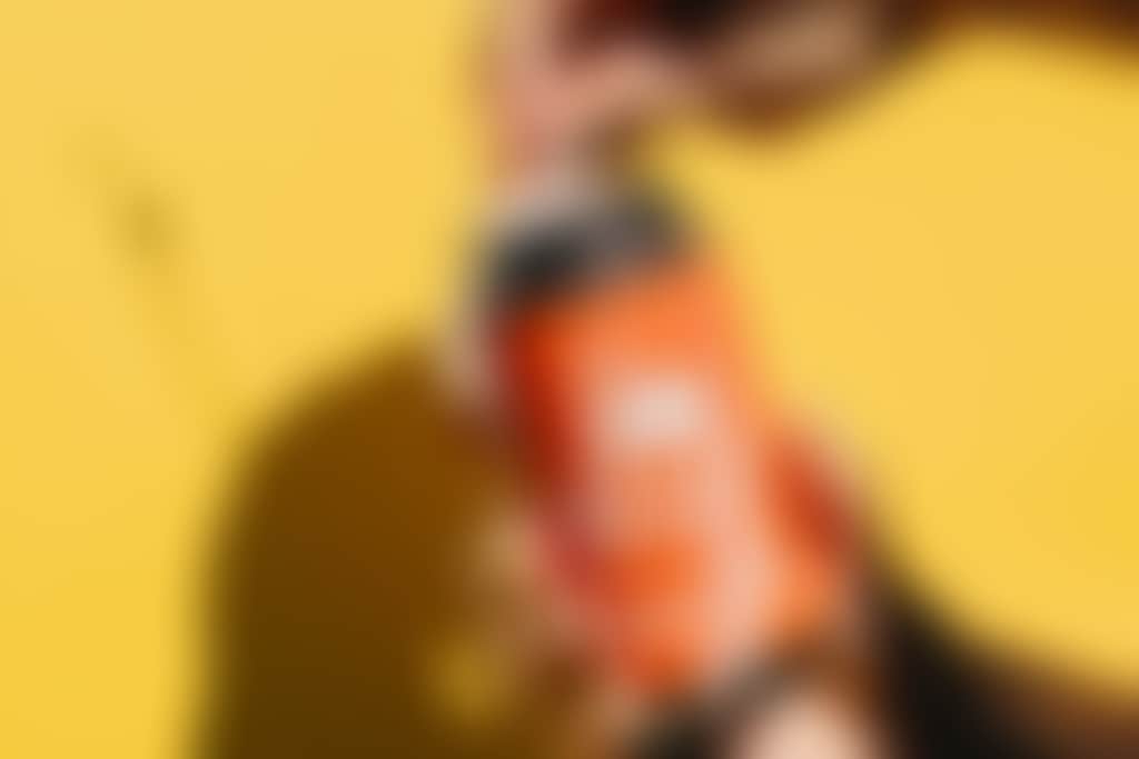 Bailey brewing co popping a can of ginger beer