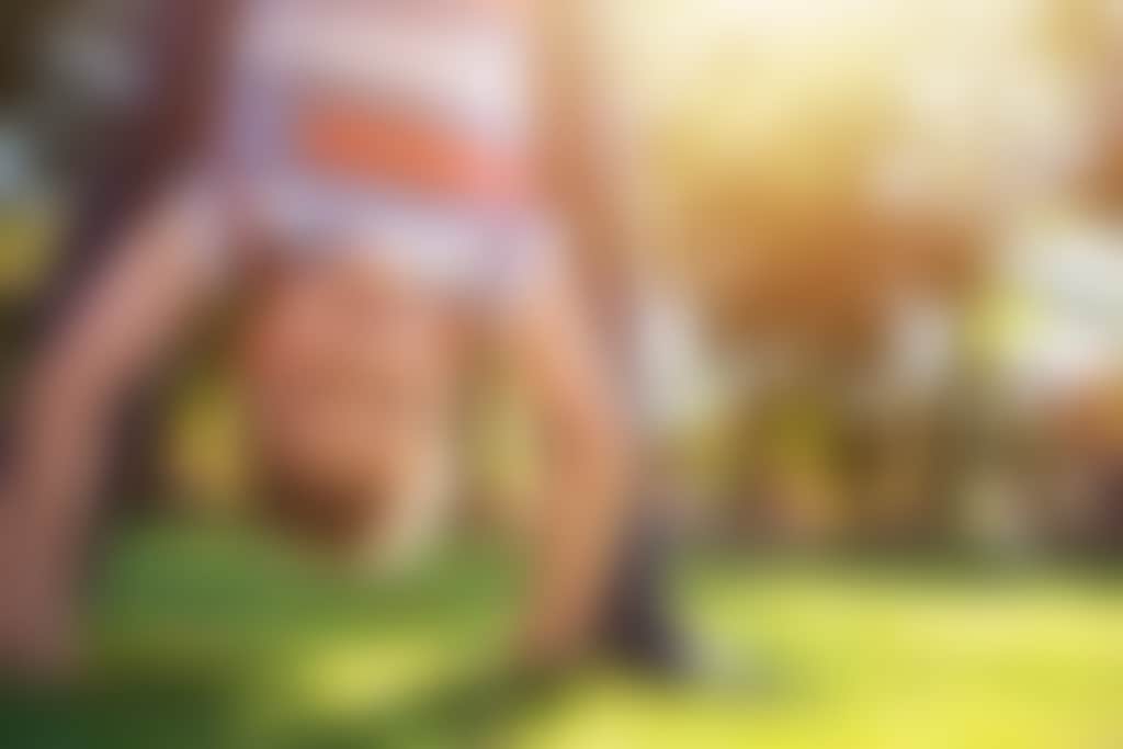 Kid doing handstand d