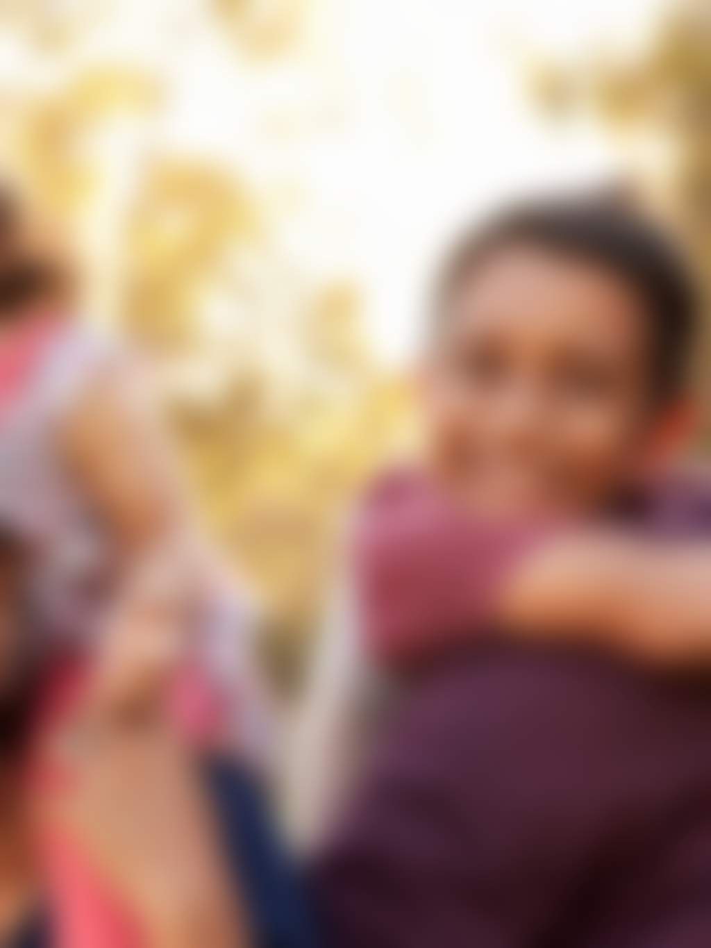 Family of four outdoors d