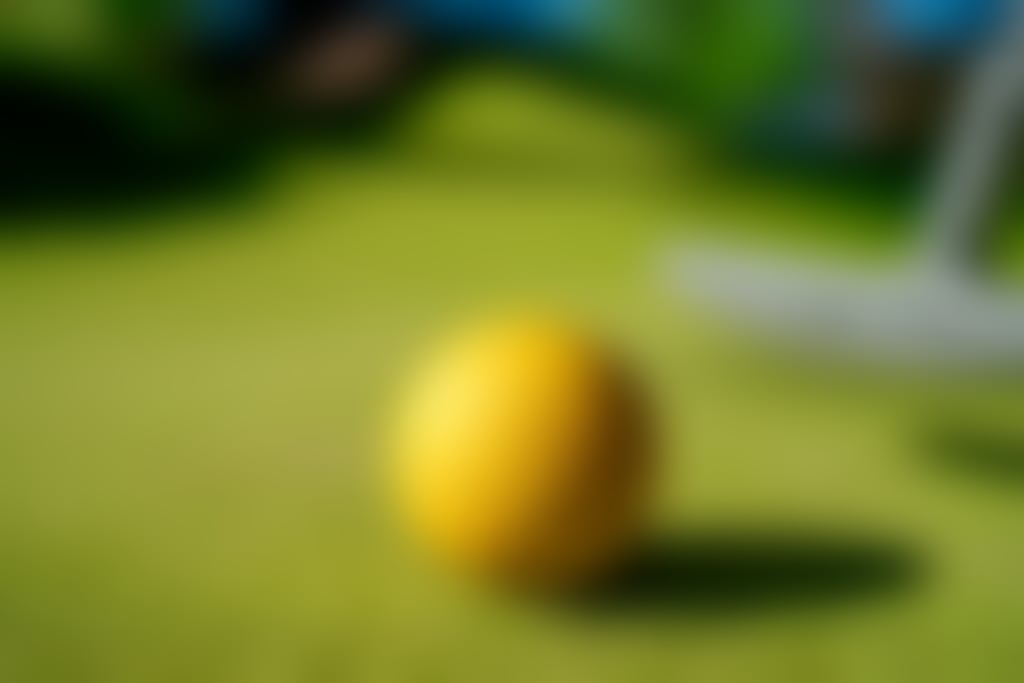 Mini golf with yellow ball