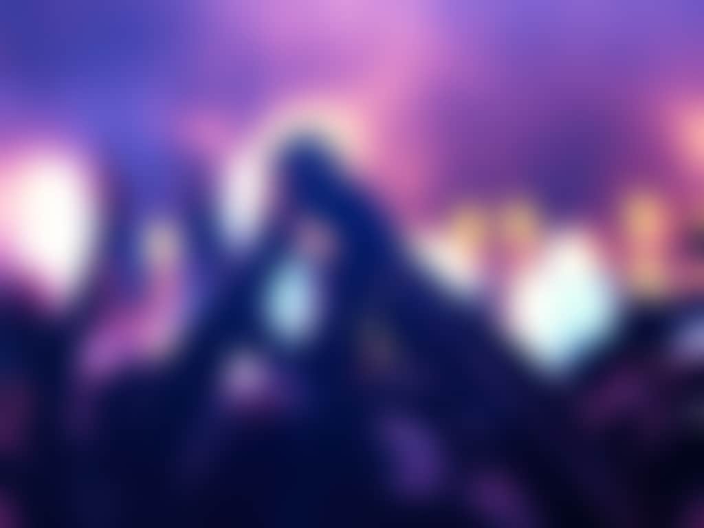 Live music crowd raised hands