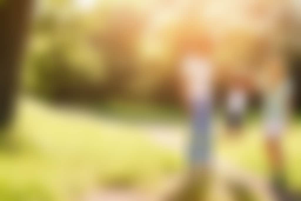 Family of three outdoors d