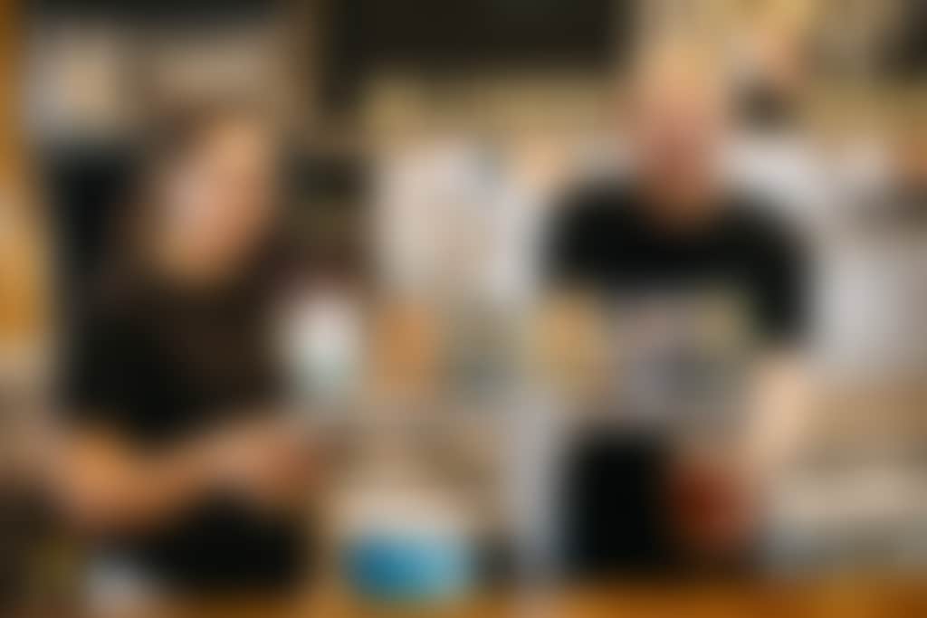 Baskerville tavern bar staff pour from taps