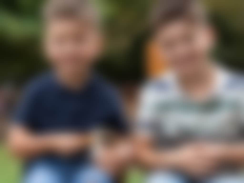 Cuddly animal farm boys