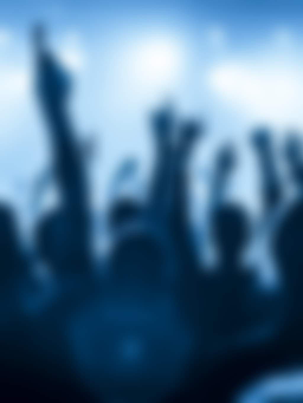 Live music crowd hands in the air