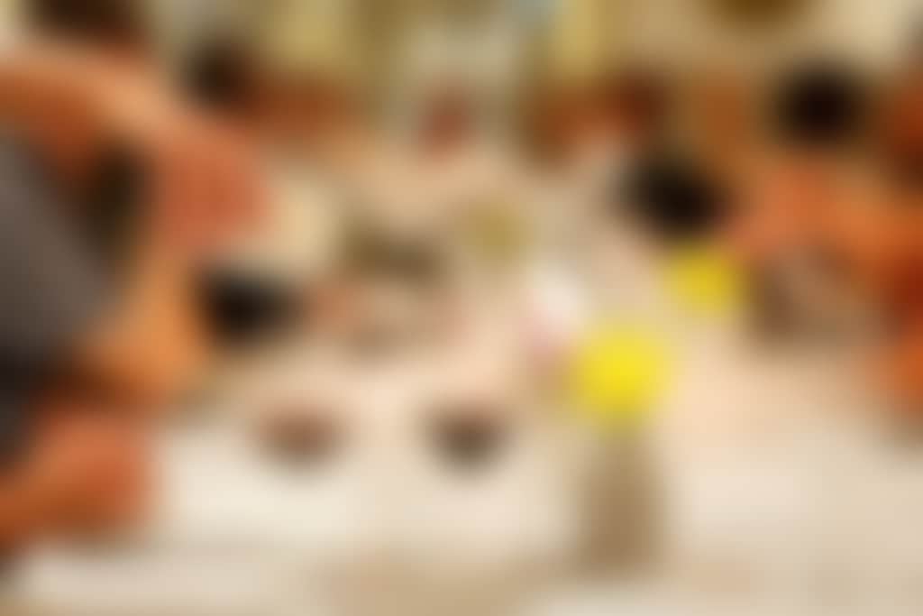 Sandalford pouring wine at table