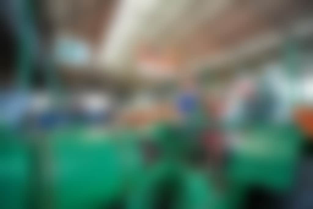 Tractor museum volunteer and visitors